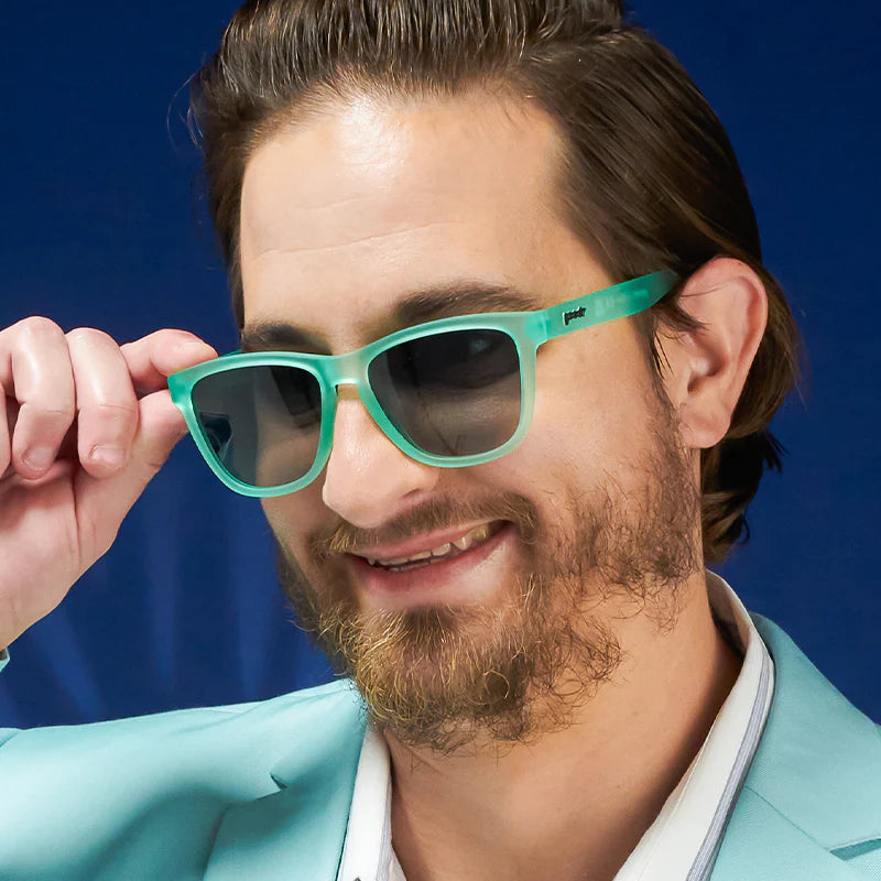Men&#39;s style and fit showcase of mint coloured square-frame sunglasses.