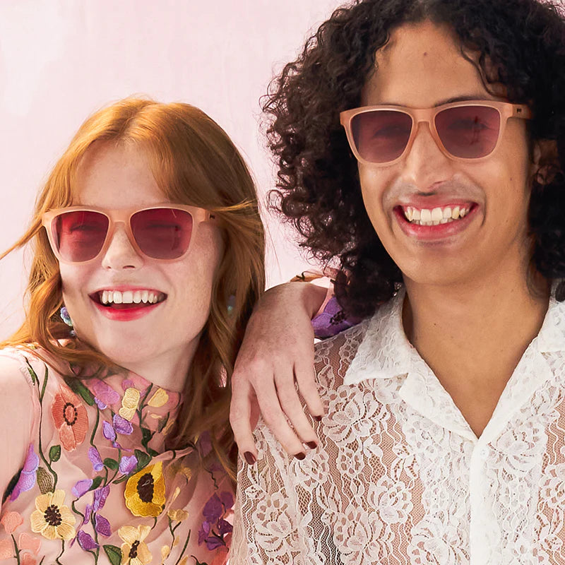 Men&#39;s &amp; Women&#39;s fit and style showcase of pink square-shaped sunglasses with pink gradient lenses.