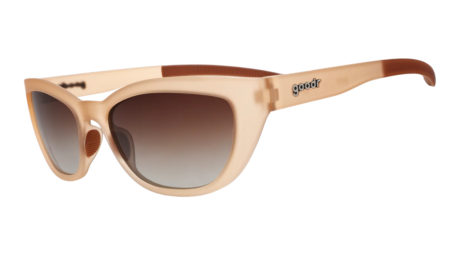 Translucent brown sunglasses in a cat-eye shape. Polarised brown gradient lenses with UV400 protection.